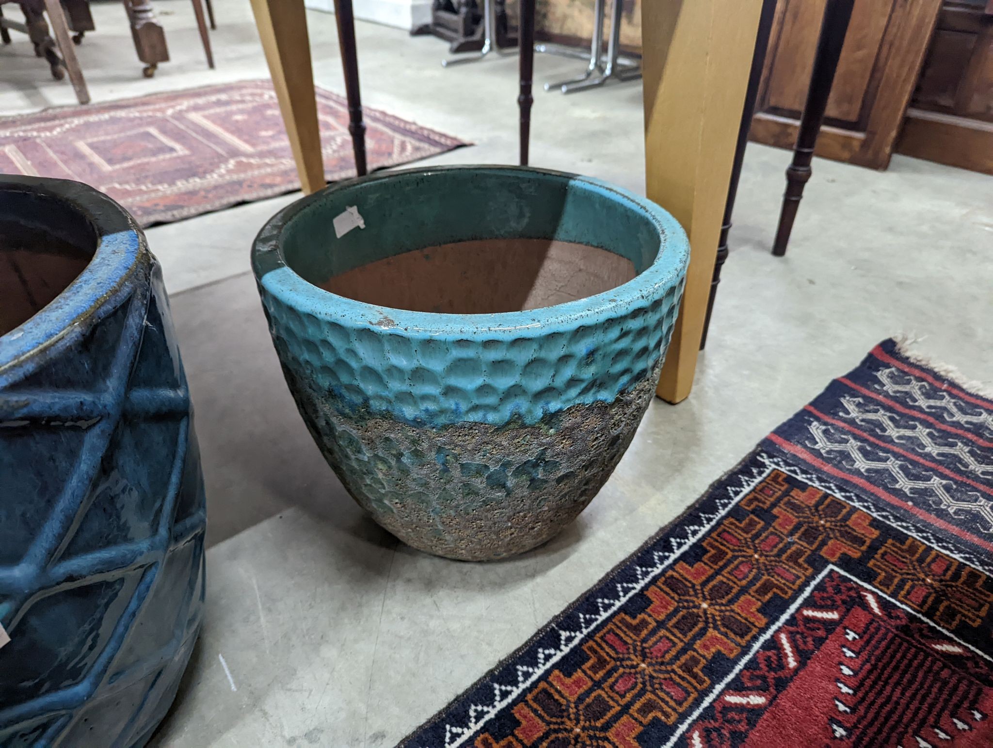 Three glazed earthenware garden planters, largest diameter 45cm